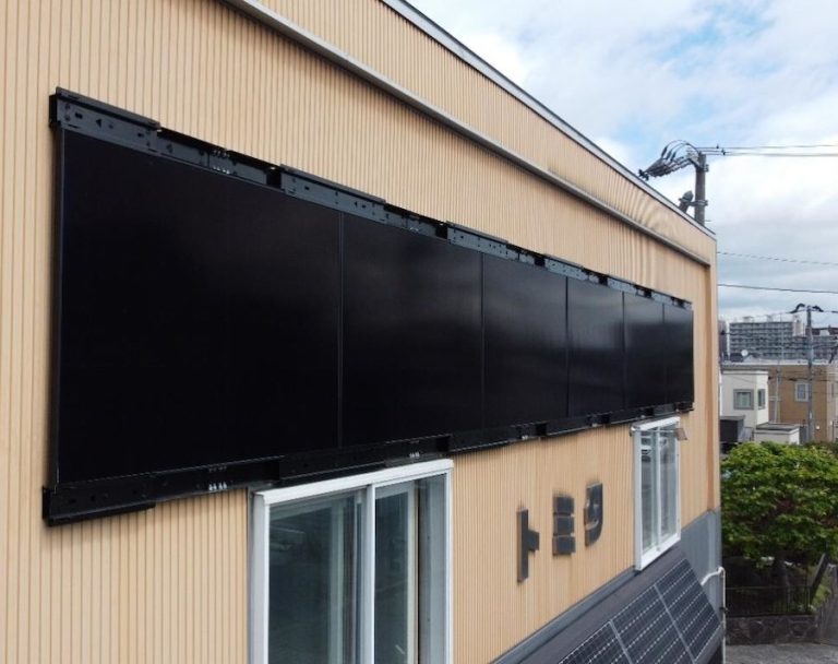 Vertical, all-black solar system seeks to power through the winter snow